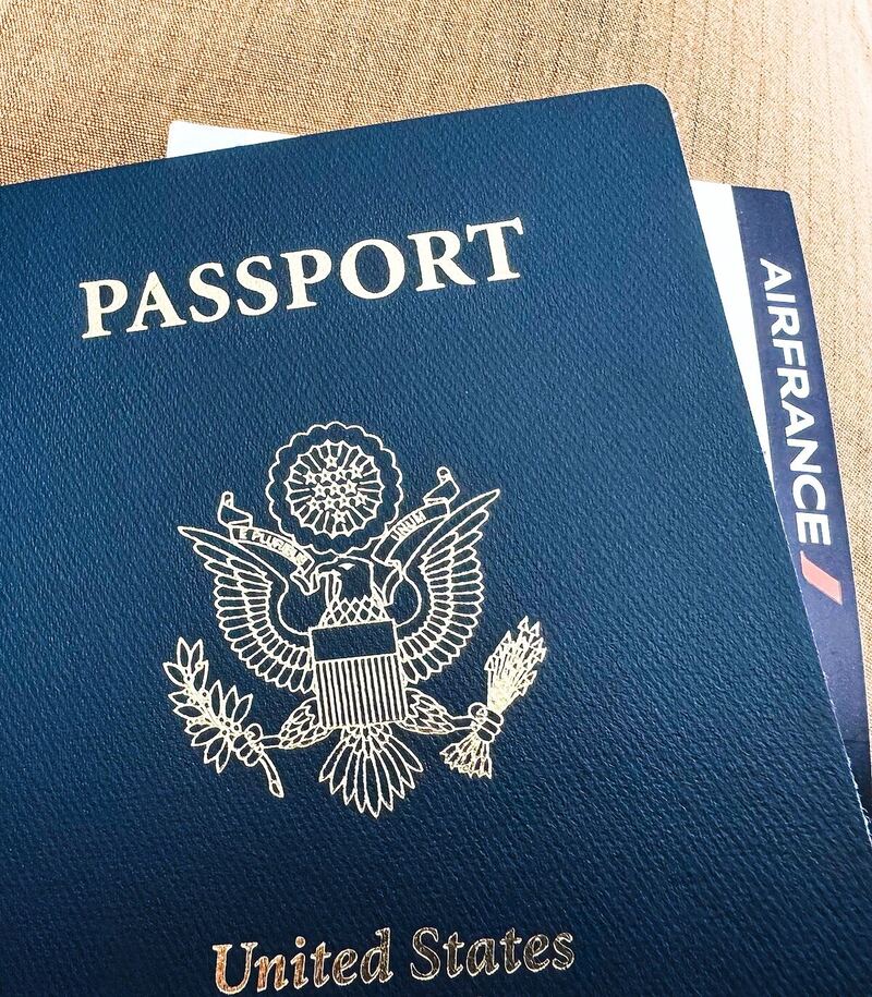 Passport and airline boarding pass, the transport component that unlocks a hotel package rate